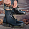 Waterproof leather boots, perfect for all-weather riding.