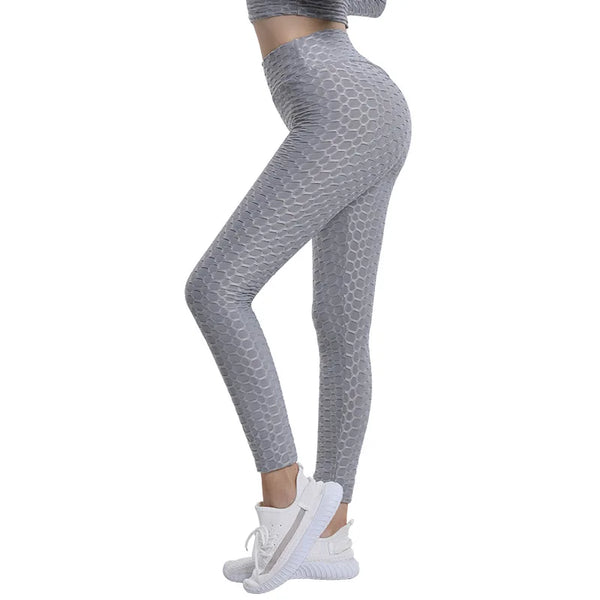 High waist push-up yoga leggings in vibrant purple, designed for style and comfort during workouts.