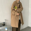 Chic Japanese vintage trench coat for men in black, featuring a single-breasted closure and stylish turn-down collar.