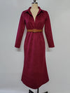 Back view of the Autumn Whispers dress, emphasizing the elegant silhouette and full sleeves.