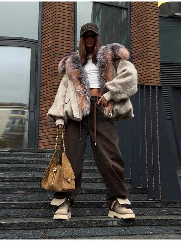 Oversized cotton-padded hooded jacket with zipper front and cozy silhouette