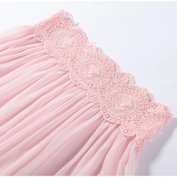 Sophisticated lace top featuring delicate tatting and regular fit design