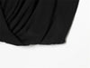 Timeless sleeveless black pleated top with feminine ribbon detail