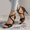 Sophisticated cream stiletto heels with easy zip closure and open toe.