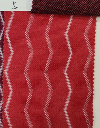 Detail shot of the fabric blend of cotton and spandex in the men's wedding suit.