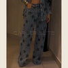 Premium cotton-polyester blend denim jeans featuring high waist and comfortable wide leg design