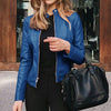 Chic slim fit faux leather moto jacket for women, perfect for autumn and winter with a stylish zipper closure and tailored fi