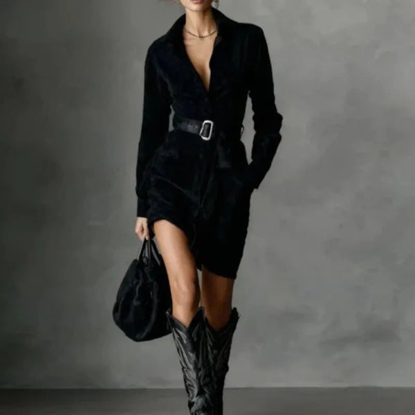 Model confidently wearing the Midnight Whispers Suede Mini dress at a party.