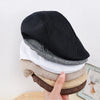 Casual beret perfect for leisurely strolls through cobblestone streets.