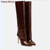 Knee-high stiletto boots designed for elegance and comfort.
