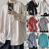 Oversized long sleeve casual shirt for men and women with Mandarin collar, perfect for spring and autumn fashion.