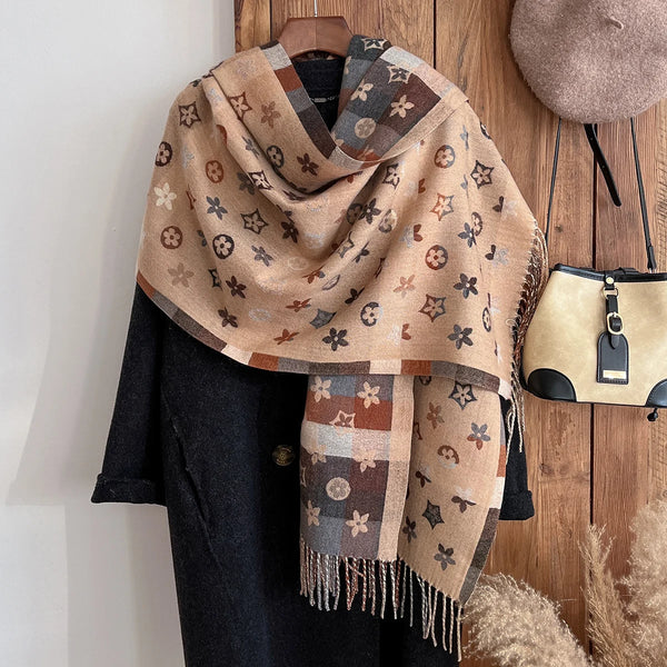 Elegant women's scarf displayed with winter fashion accessories.