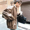 Chic genuine leather jacket for women with zippered closure, tailored fit, perfect for autumn and winter outings.