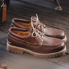 Red brown derby lace-up shoes side view displaying classic silhouette