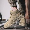 Side view of lace-up black Winter Vanguard boots for stylish winter adventures.