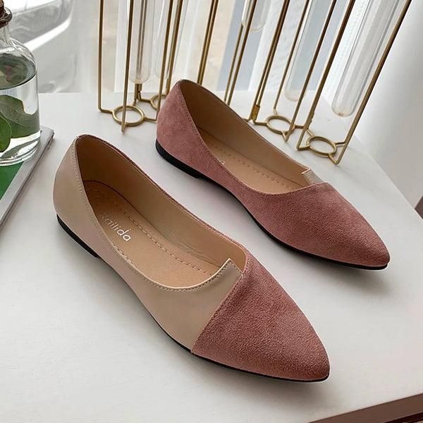 Side view of slip-on ballet flats with pointed toe and shallow design