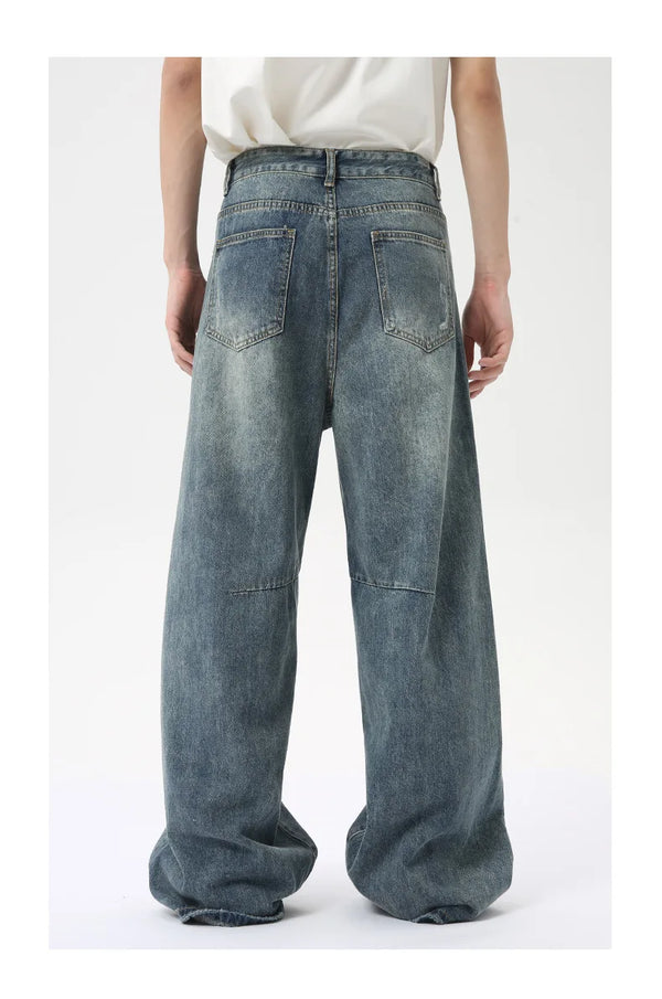 Casual men's wide leg jeans in washed blue with full-length design