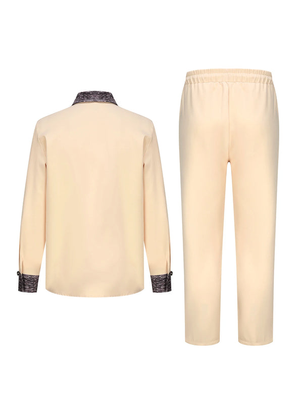 Men's cultural outfit featuring African print patchwork shirt with full-length sleeves and matching pants