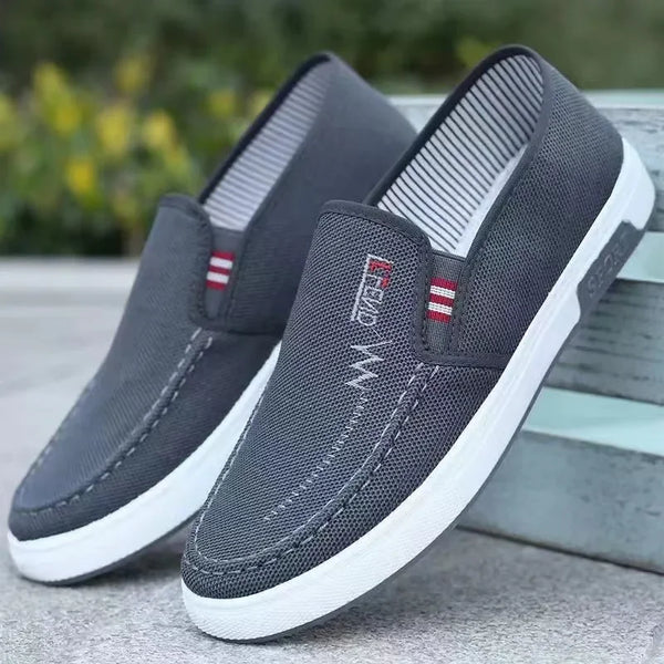 Men's gray canvas sneakers with cushioned EVA insole and moisture-wicking lining