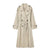 Versatile double-breasted trench coat paired with denim for casual chic look