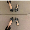 Sophisticated pointed sandals with feminine bow detail and cushioned footbed
