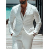 Close-up of the two-button jacket closure on the white linen suit.