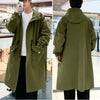 Stylish men's mid-length trench coat with hood, big pockets, and windproof features for autumn and spring outdoor wear.