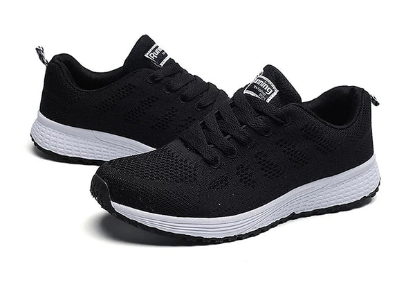 Women's white mesh sneakers with multi-color accents for all-day comfort