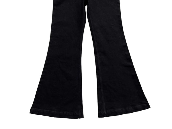Model walking in Midnight Voyager jeans, demonstrating comfort and movement.