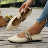 Women's knitted pointed toe flats featuring modern color-block pattern and slip-on design