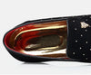 Men's loafers with pointed toe shape, offering a sleek and modern look.