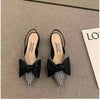Women's pointed sandals with bow embellishment and all-day comfort cushioning
