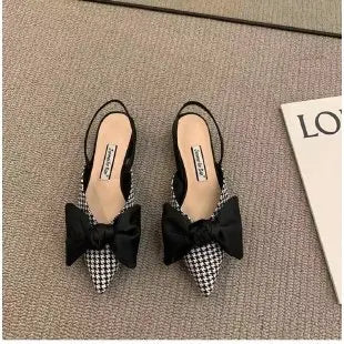 Women's pointed sandals with bow embellishment and all-day comfort cushioning