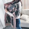 Cozy Cashmere Embrace scarf draped over a stylish winter outfit.