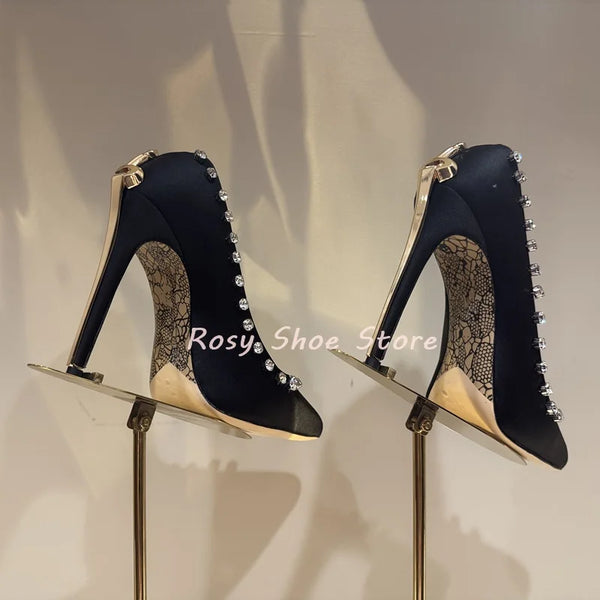 Stylish black pumps with luxury crystal inlays for evening wear.