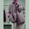 Transitional outerwear piece in khaki with quilted pattern perfect for autumn and winter layering