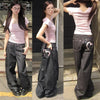 Light-wash wide-fit Sunset Boulevard Jeans with paint splatter details.