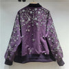 Functional zipper closure with sequin embroidered jacket front detail