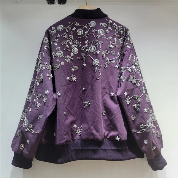 Functional zipper closure with sequin embroidered jacket front detail