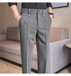 Men's slim fit dress pants in British style with elastic waist, perfect for formal and casual occasions, made from polyester