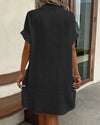 Cotton-linen blend mini dress featuring classic V-neck design and breezy summer fabric