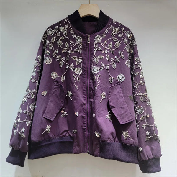Stand-up collar jacket styled for evening wear with shimmering embellishments