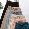 Chic wide leg summer pants for women in ice silk, pleated design, lightweight, breathable, and perfect for casual outings.