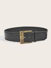 Vintage wide belt for women in black faux leather with metal buckle, perfect for casual or formal wear. Stylish accessory.