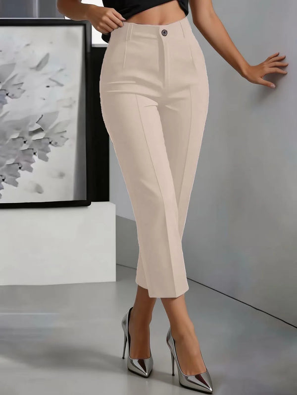 Detail shot of functional side pockets on high-waist straight leg trousers