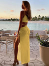 Soft polyester dress featuring unique neckline and split hem
