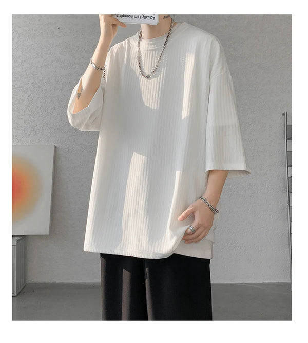 Summer styling with striped tee, ideal for coffee runs or lounging at home.