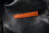 Vintage A2 leather flight jacket folded neatly to show its craftsmanship.