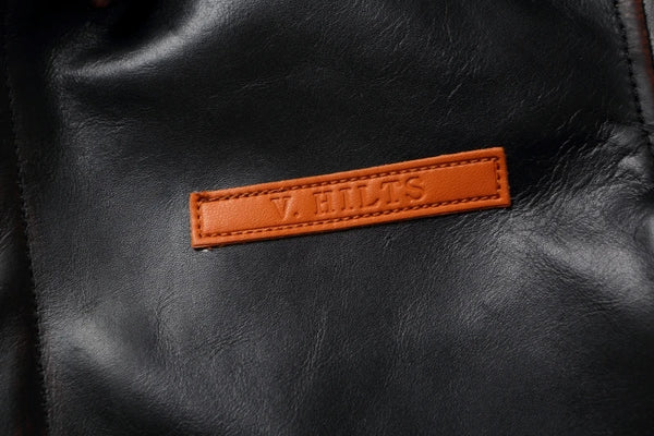 Vintage A2 leather flight jacket folded neatly to show its craftsmanship.