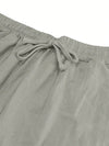 Women's loose fit linen pants with functional pockets and adjustable waist